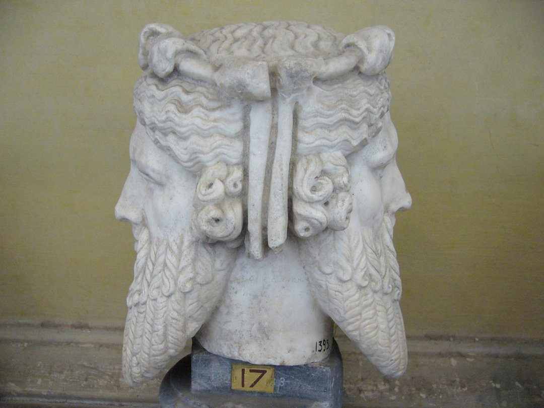 Photograph of the head of a statue of Janus, the two-faced god of transitions.